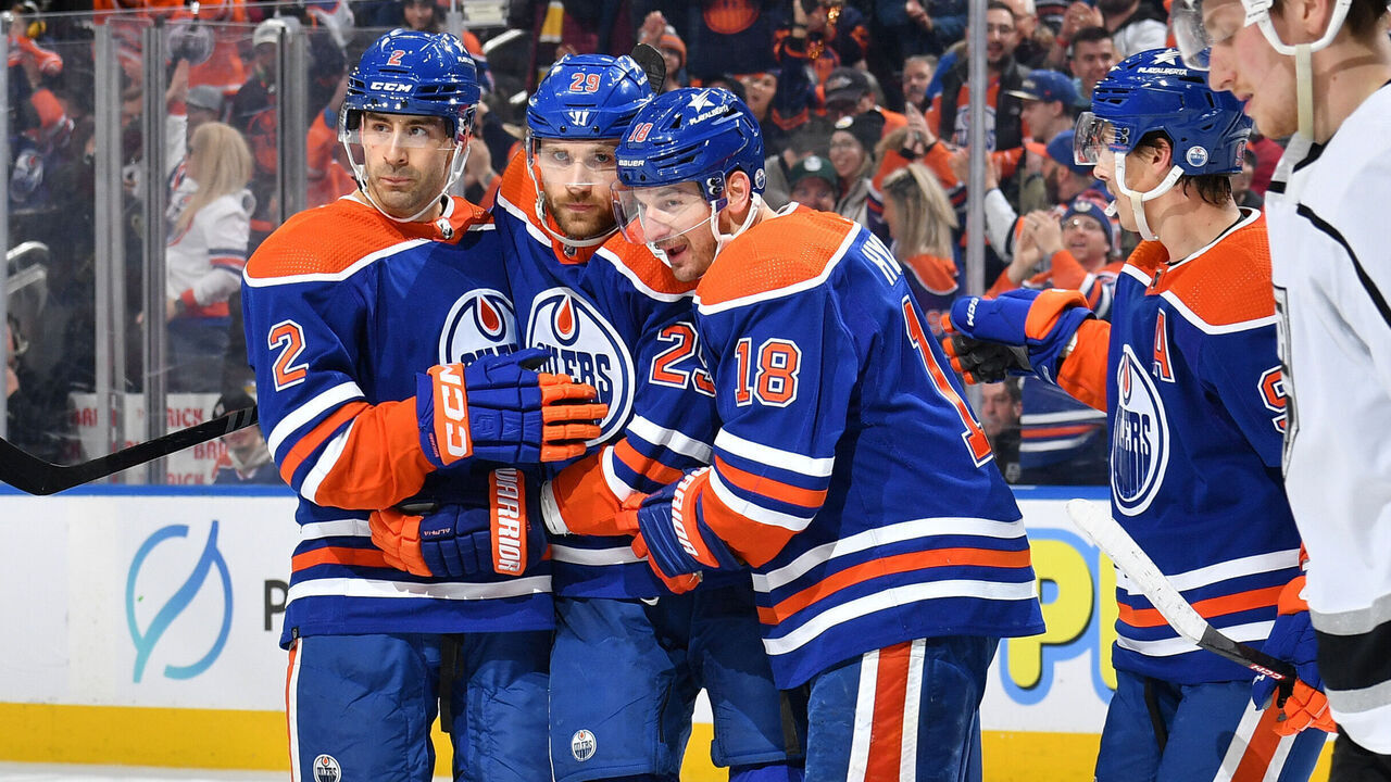 EDMONTON, CANADA - FEBRUARY 26: Leon Draisaitl #29 of the Edmonton Oilers celebrates his second-period goal against the Los Angeles Kings with teammates Evan Bouchard #2, Ryan Nugent-Hopkins #93 and Zach Hyman #18 at Rogers Place on February 26, 2024, in Edmonton, Alberta, Canada.