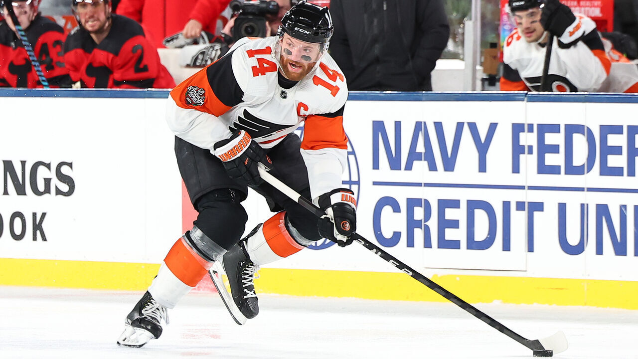 EAST RUTHERFORD, NJ - FEBRUARY 17: Sean Couturier of the Philadelphia Flyers skates during the 2024 Navy Federal Credit Union Stadium Series game against the New Jersey Devils at MetLife Stadium on February 17, 2024 in East Rutherford, New Jersey.