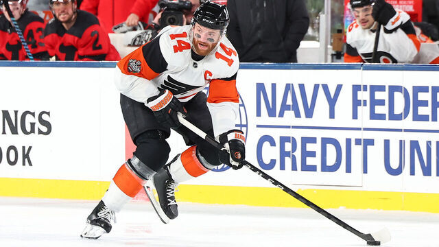 EAST RUTHERFORD, NJ - FEBRUARY 17: Sean Couturier of the Philadelphia Flyers skates during the 2024 Navy Federal Credit Union Stadium Series game against the New Jersey Devils at MetLife Stadium on February 17, 2024 in East Rutherford, New Jersey.