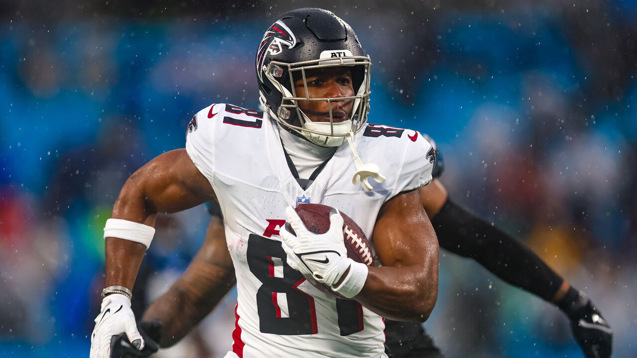 CHARLOTTE, NC - DECEMBER 17: Jonnu Smith #81 of the Atlanta Falcons runs the ball during an NFL game against the Carolina Panthers at Bank of America Stadium in Charlotte, North Carolina on Dec 17, 2023.