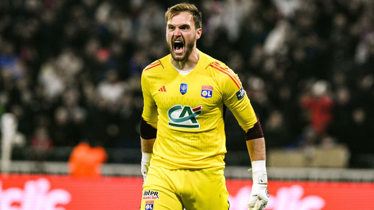 Lyon's French goalkeeper #23 Lucas Perri celebrates after stopping a penalty during the French Cup (Coupe de France) quarter final match between Olympique Lyonnais (OL) and RC Strasbourg Alsace at the Groupama Stadium, in Decines-Charpieu, east of Lyon on February 27, 2024.