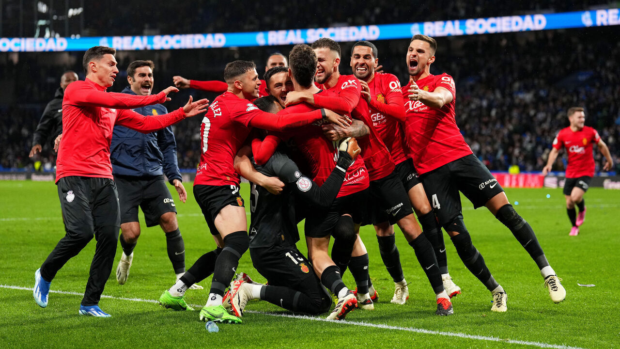 SAN SEBASTIAN, SPAIN - FEBRUARY 27: Players of RCD Mallorca celebrate after the team's victory in the penalty shoot out in the Copa del Rey Semifinal match between Real Sociedad and RCD Mallorca at Reale Arena on February 27, 2024 in San Sebastian, Spain.