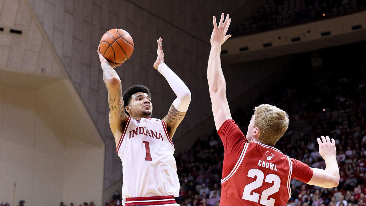 BLOOMINGTON, INDIANA - FEBRUARY 27: Kel'el Ware #1 of the Indiana Hoosiers shoots the ball while defended by Steven Crowl #22 of the Wisconsin Badgers in the first half at Simon Skjodt Assembly Hall on February 27, 2024 in Bloomington, Indiana.