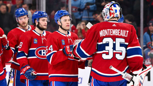 MONTREAL, CANADA - FEBRUARY 27: Jordan Harris #54 and goaltender Sam Montembeault #35 of the Montreal Canadiens celebrate a 4-2 victory against the Arizona Coyotes at the Bell Centre on February 27, 2024 in Montreal, Quebec, Canada.