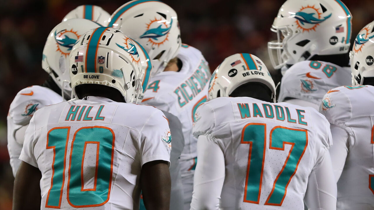 KANSAS CITY, MO - JANUARY 13: Miami Dolphins wide receivers Tyreek Hill (10) and Jaylen Waddle (17) in the huddle during an AFC Wild Card playoff game between the Miami Dolphins and Kansas City Chiefs on Jan 13, 2024 at GEHA Field at Arrowhead Stadium in Kansas City, MO.