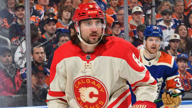 EDMONTON, CANADA - FEBRUARY 24: Chris Tanev #8 of the Calgary Flames in action during the game against the Edmonton Oilers at Rogers Place on February 24, 2024, in Edmonton, Alberta, Canada.