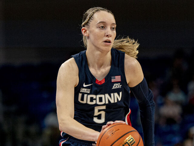 CHICAGO, IL - FEBRUARY 25: UConn Huskies guard Paige Bueckers (5) drives to the basket during the women's college basketball game between the UConn Huskies and the Depaul Blue Demons on February 25, 2024, at Wintrust Arena in Chicago, IL.