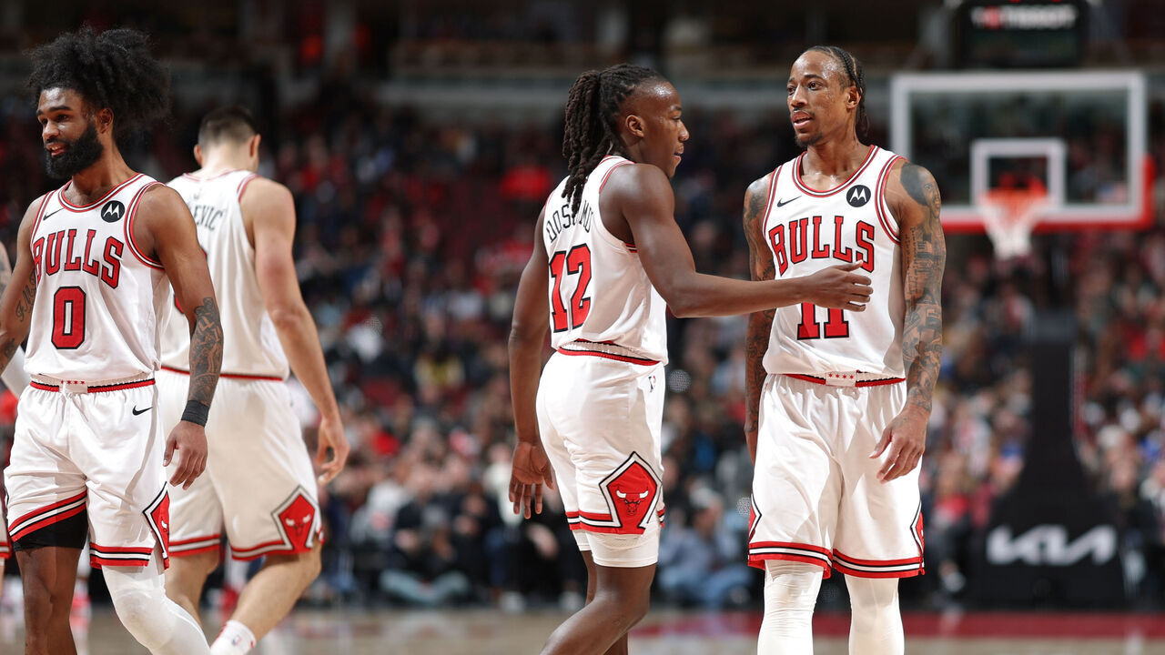 CHICAGO, IL - FEBRUARY 28: Ayo Dosunmu #12 and DeMar DeRozan #11 of the Chicago Bulls high five during the game against the Cleveland Cavaliers on February 28, 2024 at United Center in Chicago, Illinois. Mandatory Copyright Notice: Copyright 2024 NBAE