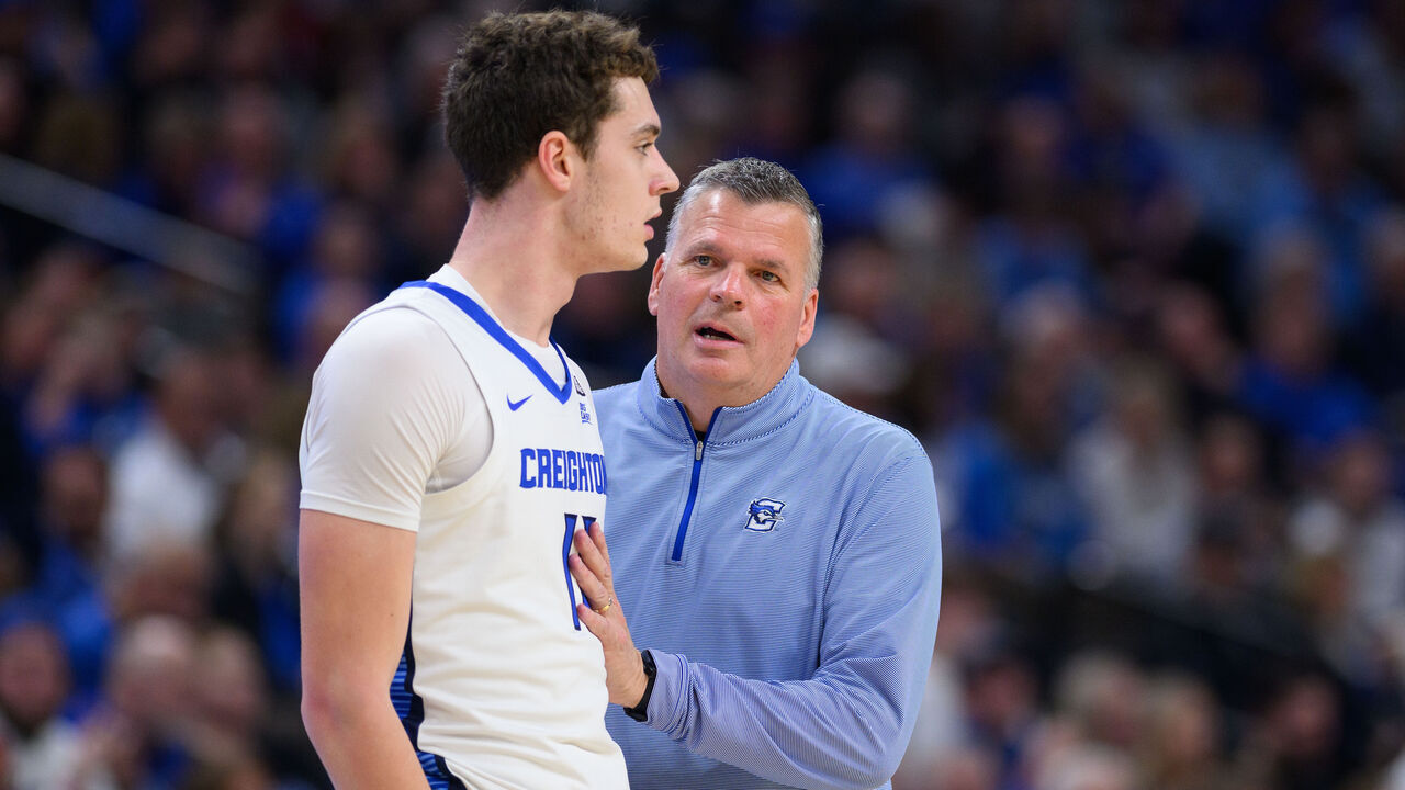 OMAHA, NE - FEBRUARY 02: Creighton Bluejays center Ryan Kalkbrenner (11) talks to Creighton Bluejays head coach Greg McDermott on the sidelines during the men's college basketball game between the Butler Bulldogs and Creighton Bluejays on February 2, 2024, at CHI Health Center Omaha in Omaha, NE.