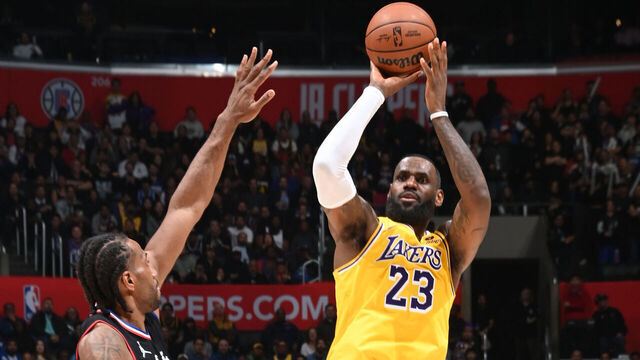 LOS ANGELES, CA - FEBRUARY 28: LeBron James #23 of the Los Angeles Lakers shoots the ball during the game against the LA Clippers on February 28, 2024 at Crypto.Com Arena in Los Angeles, California. NOTE TO USER: User expressly acknowledges and agrees that, by downloading and/or using this Photograph, user is consenting to the terms and conditions of the Getty Images License Agreement. Mandatory Copyright Notice: Copyright 2024 NBAE
