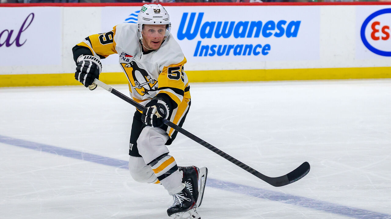 WINNIPEG, CANADA - FEBRUARY 10: Jake Guentzel #59 of the Pittsburgh Penguins skates during third period action against the Winnipeg Jets at Canada Life Centre on February 10, 2024 in Winnipeg, Manitoba, Canada.