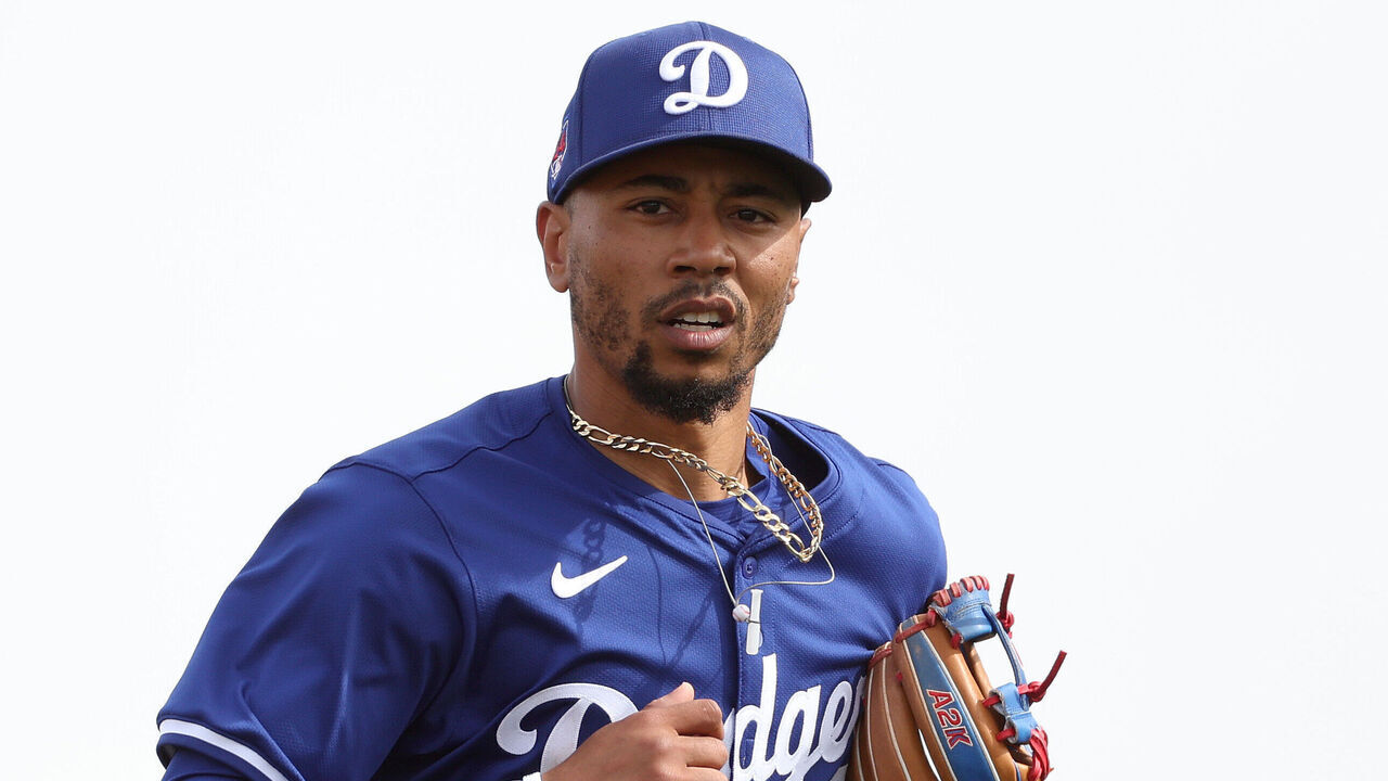 TEMPE, ARIZONA - FEBRUARY 24: Mookie Betts #50 of the Los Angeles Dodgers reacts after a play against the Los Angeles Angels during a spring training exhibition at the Peoria Sports Complex on February 24, 2024 in Tempe, Arizona.