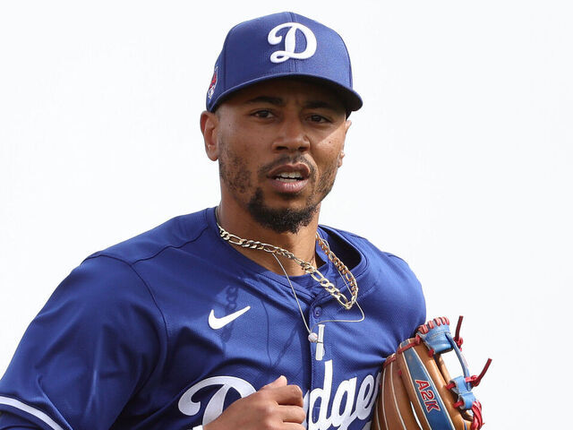 TEMPE, ARIZONA - FEBRUARY 24: Mookie Betts #50 of the Los Angeles Dodgers reacts after a play against the Los Angeles Angels during a spring training exhibition at the Peoria Sports Complex on February 24, 2024 in Tempe, Arizona.