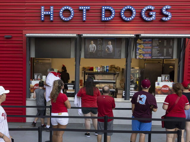 PHILADELPHIA, PA - AUGUST 24: Fans wait in line to get hot dogs prior to the game between the Philadelphia Phillies and Tampa Bay Rays at Citizens Bank Park on August 24, 2021 in Philadelphia, Pennsylvania. The Rays defeated the Phillies 3-1.