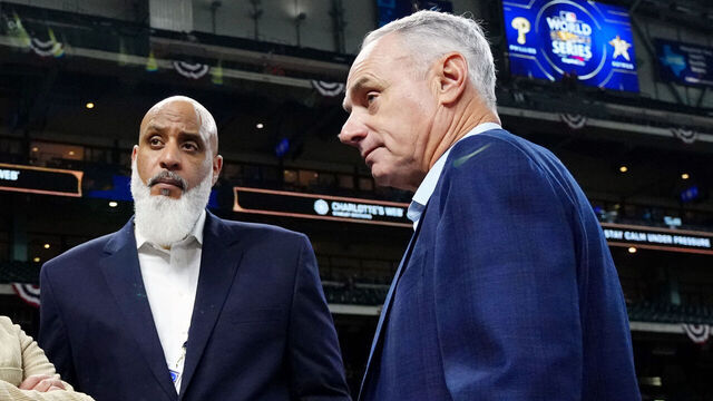 HOUSTON, TX - OCTOBER 29: Executive Director of the Major League Baseball Players Association Tony Clark and Major League Baseball Commissioner Robert D. Manfred Jr. look on during batting practice prior to Game 2 of the 2022 World Series between the Philadelphia Phillies and the Houston Astros at Minute Maid Park on Saturday, October 29, 2022 in Houston, Texas.