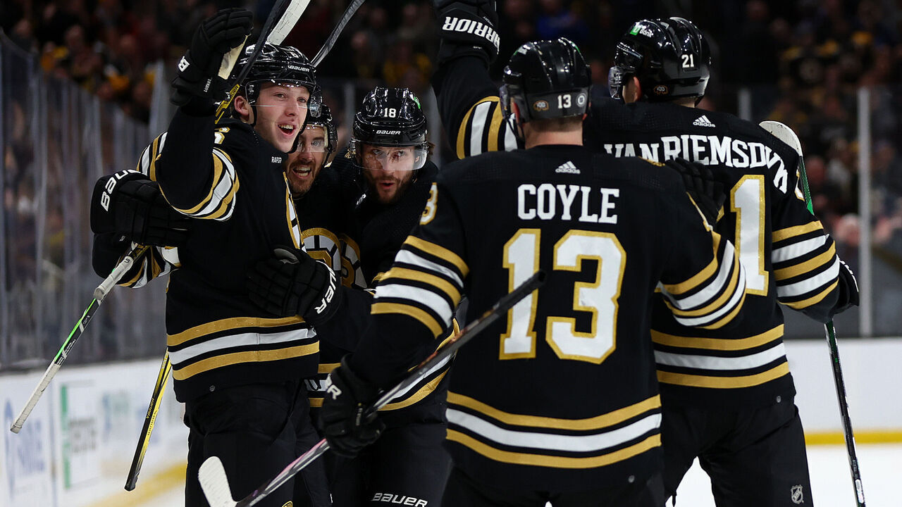 BOSTON, MASSACHUSETTS - FEBRUARY 29: Mason Lohrei #6 of the Boston Bruins celebrates with Kevin Shattenkirk #12, Pavel Zacha #18, Charlie Coyle #13, and James van Riemsdyk #21 after scoring the game winning goal against the Vegas Golden Knights during the third period at TD Garden on February 29, 2024 in Boston, Massachusetts. The Bruins defeat the Knights 5-4