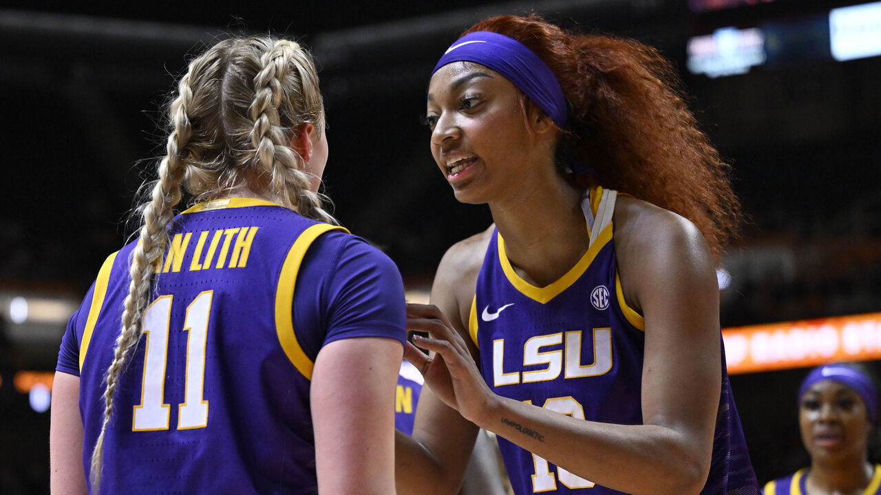 KNOXVILLE, TENNESSEE - FEBRUARY 25: Hailey Van Lith #11 and Angel Reese #10 of the LSU Lady Tigers speak against the Tennessee Lady Vols in the second quarter at Thompson-Boling Arena on February 25, 2024 in Knoxville, Tennessee.