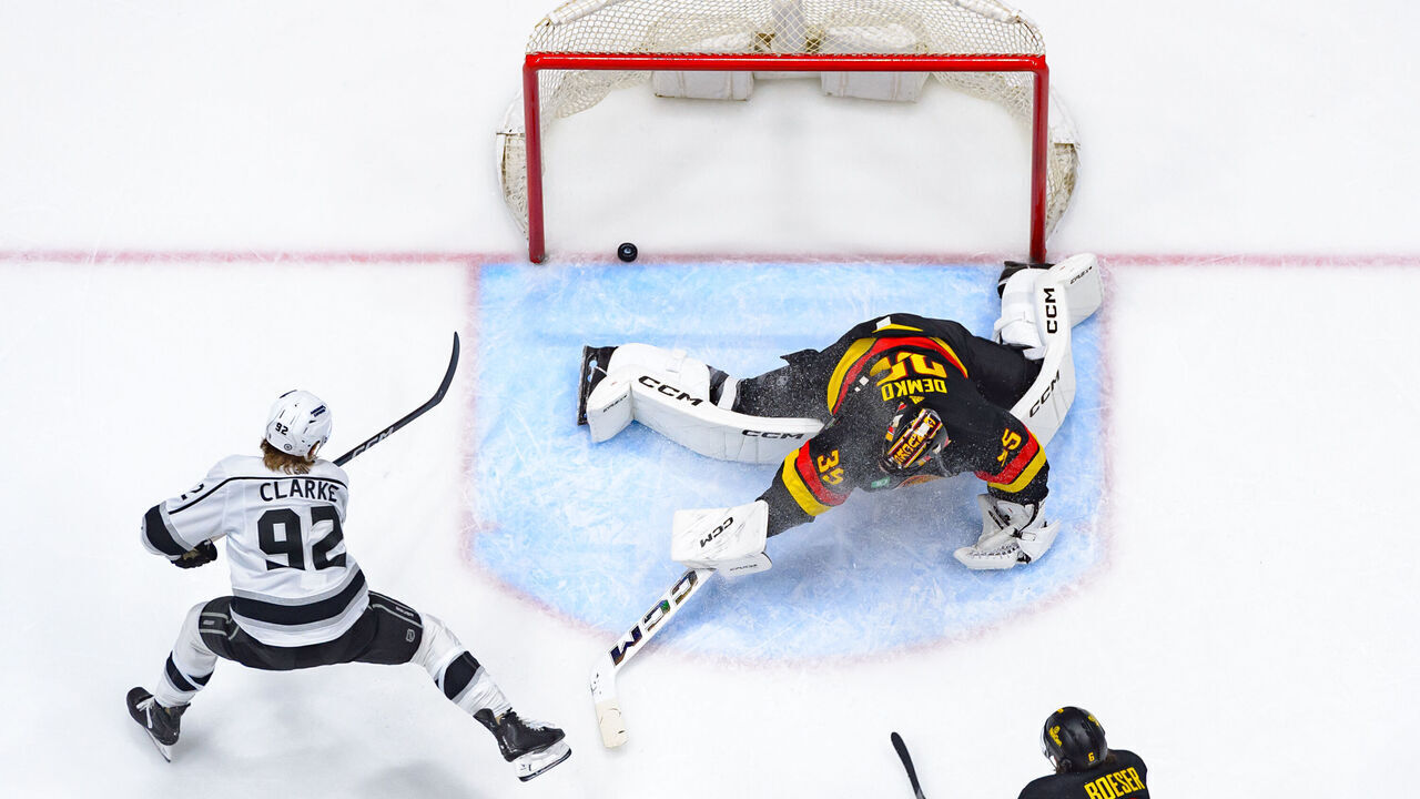 VANCOUVER, CANADA - FEBRUARY 29: Brandt Clarke #92 of the Los Angeles Kings scores a goal on Thatcher Demko #35 of the Vancouver Canucks during the third period of their NHL game at Rogers Arena on February 29, 2024 in Vancouver, British Columbia, Canada.
