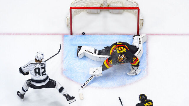 VANCOUVER, CANADA - FEBRUARY 29: Brandt Clarke #92 of the Los Angeles Kings scores a goal on Thatcher Demko #35 of the Vancouver Canucks during the third period of their NHL game at Rogers Arena on February 29, 2024 in Vancouver, British Columbia, Canada.