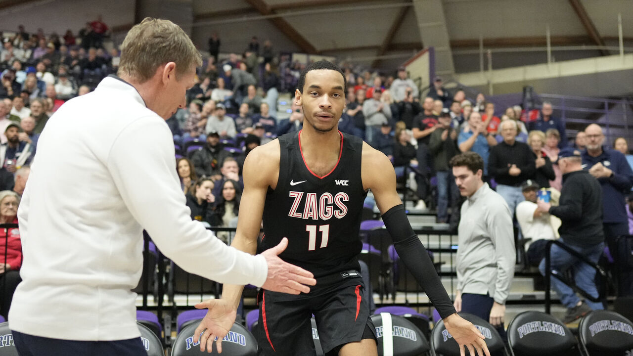 PORTLAND, OREGON - FEBRUARY 22: Nolan Hickman #11 of the Gonzaga Bulldogs is introduced as part of the starting lineup before the game against the Portland Pilot at Chiles Center on February 22, 2024 in Portland, Oregon.