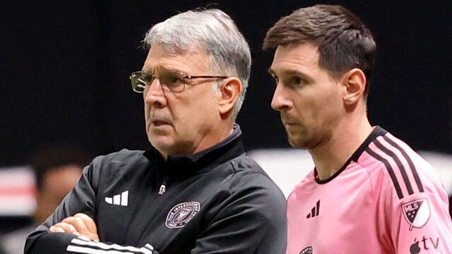 Inter Miami's Argentine coach Gerardo Martino stands with his Argentine forward #10 Lionel Messi before the latter enters the pitch during the friendly football match between Saudi Arabia's al-Nassr FC and the US Inter Miami CF at the Kingdom Arena Stadium in Riyadh on February 1, 2024.