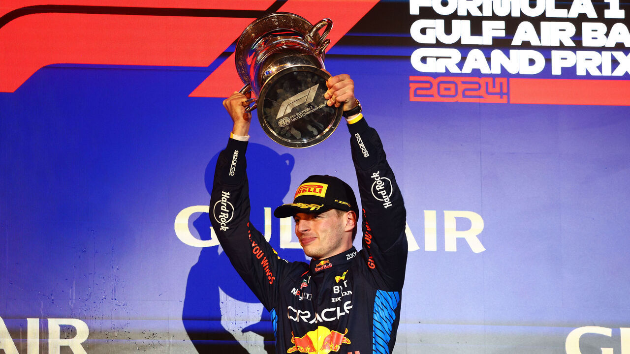 BAHRAIN, BAHRAIN - MARCH 02: Race winner Max Verstappen of the Netherlands and Oracle Red Bull Racing celebrates on the podium during the F1 Grand Prix of Bahrain at Bahrain International Circuit on March 02, 2024 in Bahrain, Bahrain.