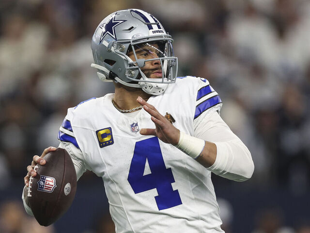 ARLINGTON, TX - JANUARY 14: Dak Prescott #4 of the Dallas Cowboys throws the ball during an NFL wild-card playoff football game against the Green Bay Packers at AT&T Stadium on January 14, 2024 in Arlington, Texas.