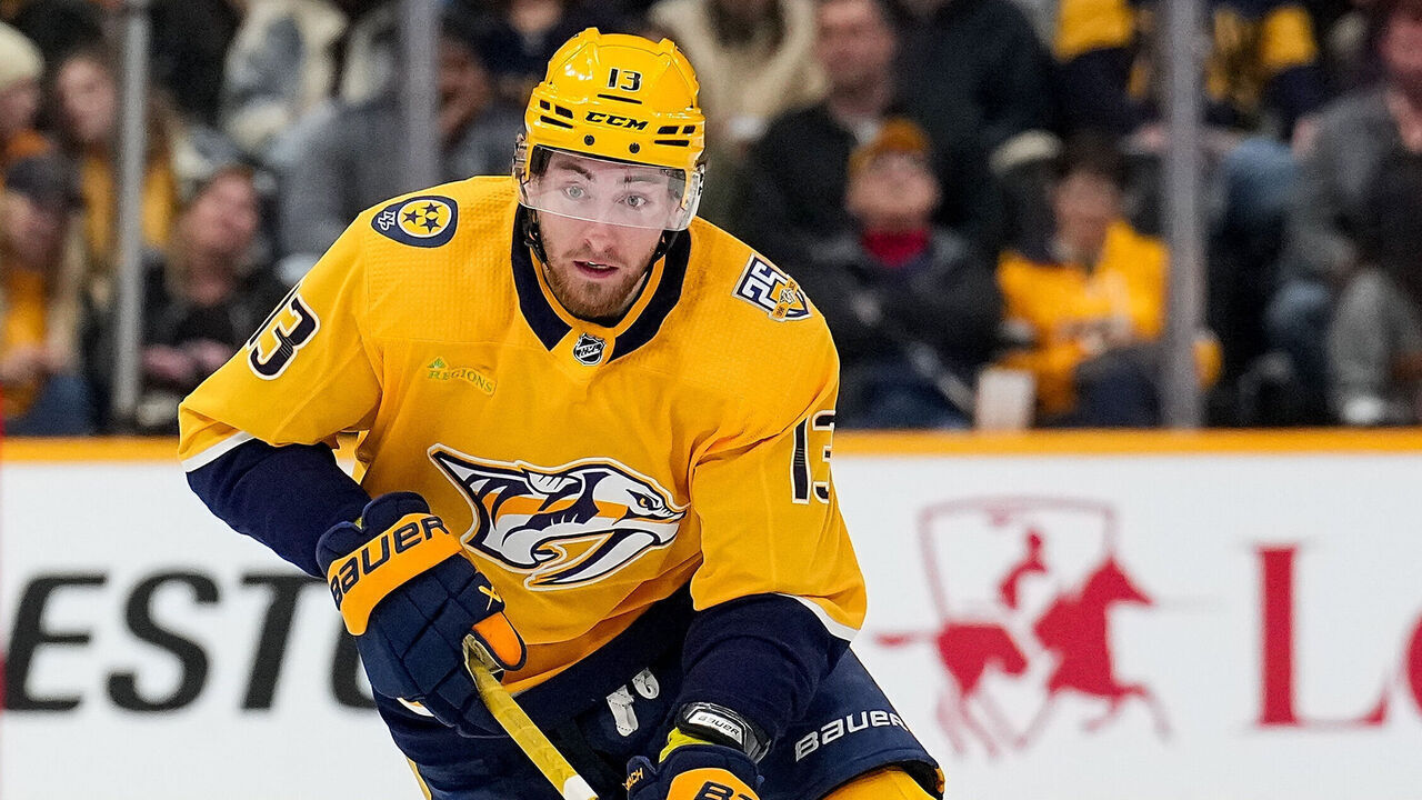 NASHVILLE, TENNESSEE - FEBRUARY 27: Yakov Trenin #13 of the Nashville Predators skates against the Ottawa Senators during an NHL game at Bridgestone Arena on February 27, 2024 in Nashville, Tennessee.