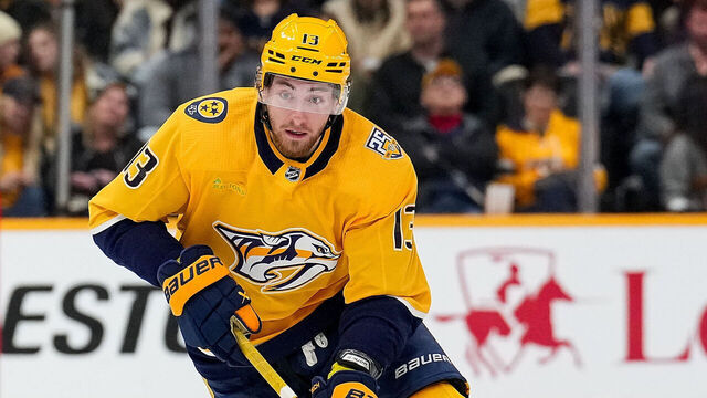NASHVILLE, TENNESSEE - FEBRUARY 27: Yakov Trenin #13 of the Nashville Predators skates against the Ottawa Senators during an NHL game at Bridgestone Arena on February 27, 2024 in Nashville, Tennessee.