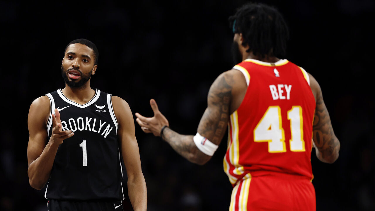 NEW YORK, NEW YORK - MARCH 02: Mikal Bridges #1 of the Brooklyn Nets celebrates scoring during the second half as Saddiq Bey #41 of the Atlanta Hawks reacts at Barclays Center on March 02, 2024 in the Brooklyn borough of New York City. The Nets won 114-102.