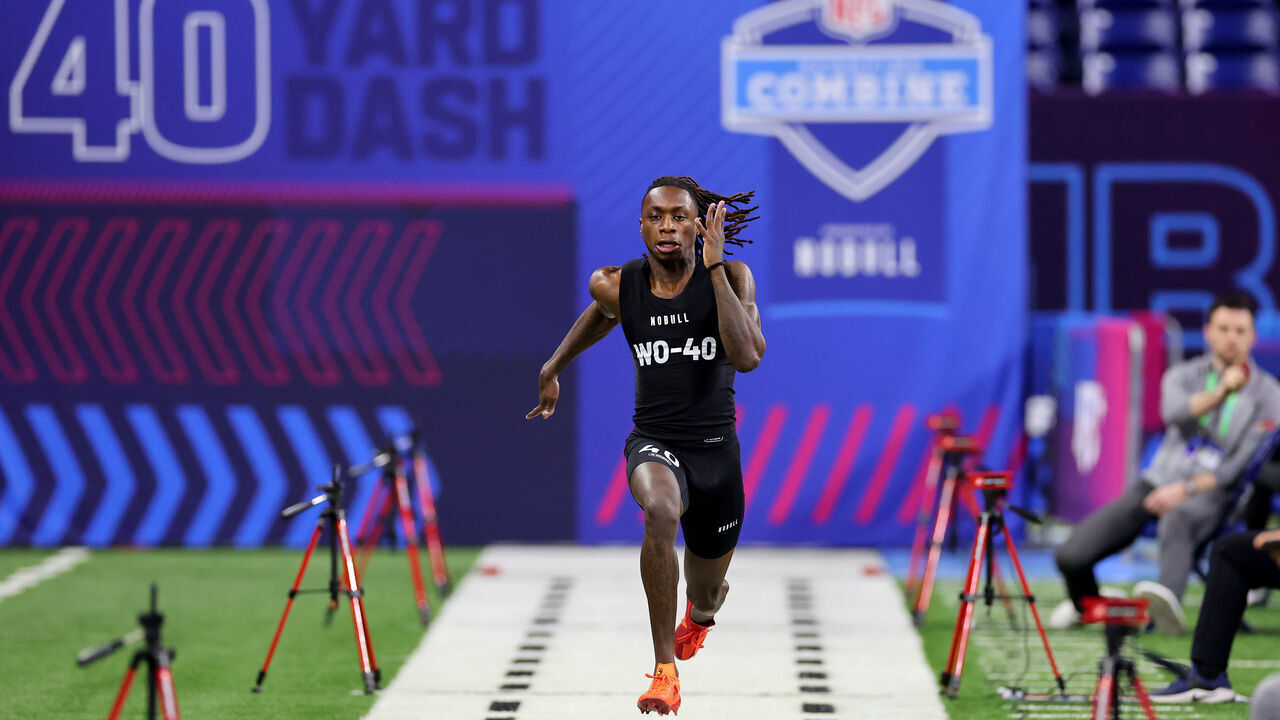 INDIANAPOLIS, INDIANA - MARCH 02: Xavier Worthy #WO40 of Texas participates in the 40-yard dash during the NFL Combine at Lucas Oil Stadium on March 02, 2024 in Indianapolis, Indiana.