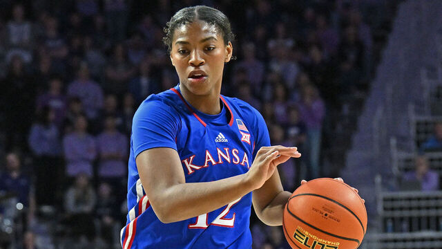 MANHATTAN, KS - JANUARY 20: S'Mya Nichols #12 of the Kansas Jayhawks dribbles the ball up court in the first half against the Kansas State Wildcats at Bramlage Coliseum on January 20, 2024 in Manhattan, Kansas.