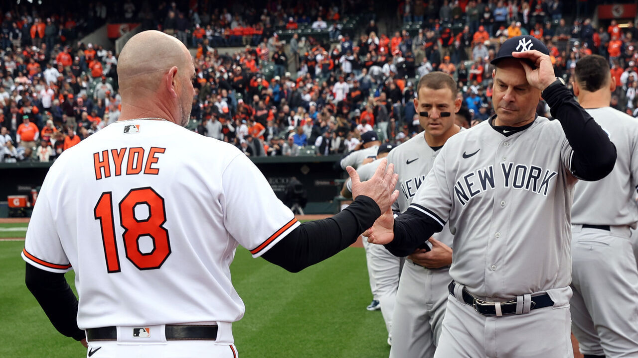 BALTIMORE, MD - APRIL 07: Manager Brandon Hyde #18 of the Baltimore Orioles shakes hands with manager Aaron Boone #17 of the New York Yankees before the game between the New York Yankees and the Baltimore Orioles at Oriole Park at Camden Yards on Friday, April 7, 2023 in Baltimore, Maryland.