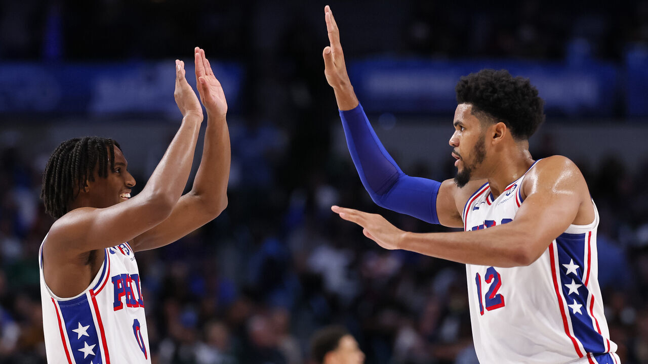 DALLAS, TEXAS - MARCH 03: Tyrese Maxey #0 and Tobias Harris #12 of the Philadelphia 76ers celebrate after a score during the second half against the Dallas Mavericks at American Airlines Center on March 03, 2024 in Dallas, Texas.