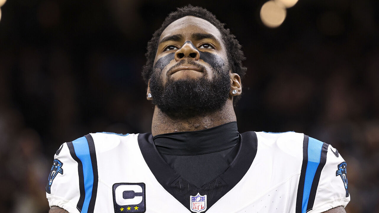 NEW ORLEANS, LA - DECEMBER 10: Brian Burns #0 of the Carolina Panthers looks on from the sideline during the national anthem prior to an NFL football game against the New Orleans Saints at Caesars Superdome on December 10, 2023 in New Orleans, LA.