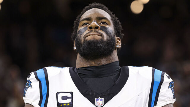 NEW ORLEANS, LA - DECEMBER 10: Brian Burns #0 of the Carolina Panthers looks on from the sideline during the national anthem prior to an NFL football game against the New Orleans Saints at Caesars Superdome on December 10, 2023 in New Orleans, LA.