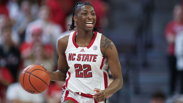 RALEIGH, NC - MARCH 03: NC State Wolfpack guard Saniya Rivers (22) brings the ball up court during the college basketball game between the NC State Wolfpack and the Wake Forest Demon Deacons on March 3, 2024 at Reynolds Coliseum in Raleigh, NC.