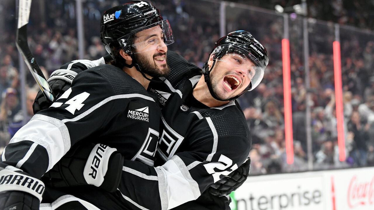 LOS ANGELES, CA - MARCH 03: Los Angeles Kings Right Wing Kevin Fiala (22) celebrates with Los Angeles Kings Center Phillip Danault (24) after Danault scored a goal during a game between the New Jersey Devil and the Los Angeles Kings on March 3rd, 2024 at the Crypto.com Arena in Los Angeles, CA.