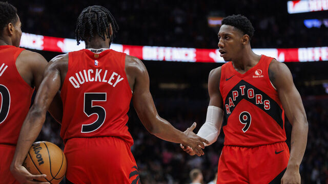 TORONTO, CANADA - MARCH 3: RJ Barrett #9 and Immanuel Quickley #5 of the Toronto Raptors react in the final seconds of the second half of their NBA game against the Charlotte Hornets at Scotiabank Arena on March 3, 2024 in Toronto, Canada.