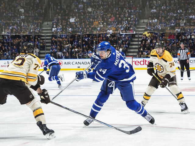 TORONTO, ON - DECEMBER 2: Auston Matthews #34 of the Toronto Maple Leafs shoots against Charlie McAvoy #73 of the Boston Bruins during the third period at the Scotiabank Arena on December 2, 2023 in Toronto, Ontario, Canada.