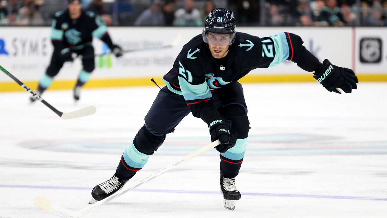 SEATTLE, WASHINGTON - FEBRUARY 29: Alex Wennberg #21 of the Seattle Kraken skates against the Pittsburgh Penguins during the second period at Climate Pledge Arena on February 29, 2024 in Seattle, Washington.