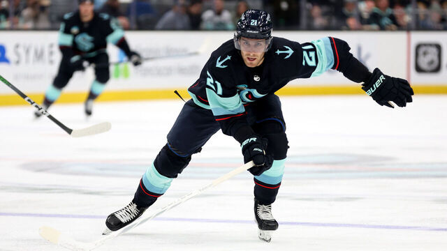 SEATTLE, WASHINGTON - FEBRUARY 29: Alex Wennberg #21 of the Seattle Kraken skates against the Pittsburgh Penguins during the second period at Climate Pledge Arena on February 29, 2024 in Seattle, Washington.