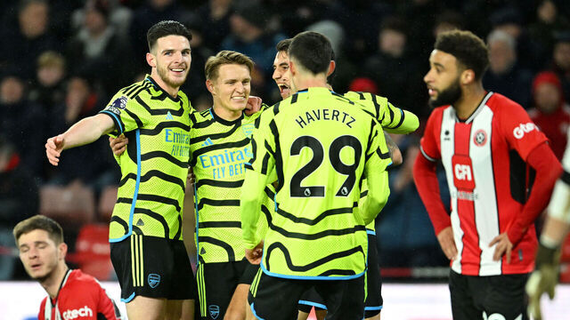 SHEFFIELD, ENGLAND - MARCH 04: Gabriel Martinelli of Arsenal (hidden) celebrates with teammates Declan Rice (L), Martin Odegaard (2L), Jakub Kiwior (C) and Kai Havertz after scoring his team's third goal during the Premier League match between Sheffield United and Arsenal FC at Bramall Lane on March 04, 2024 in Sheffield, England.