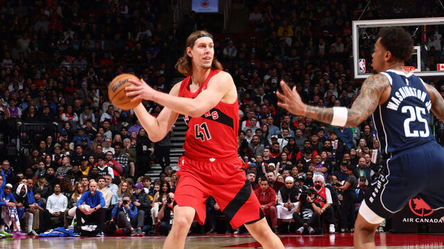 TORONTO, CANADA - FEBRUARY 28: Kelly Olynyk #41 of the Toronto Raptors looks to pass the ball during the game against the Dallas Mavericks on February 28, 2024 at the Scotiabank Arena in Toronto, Ontario, Canada. Mandatory Copyright Notice: Copyright 2024 NBAE