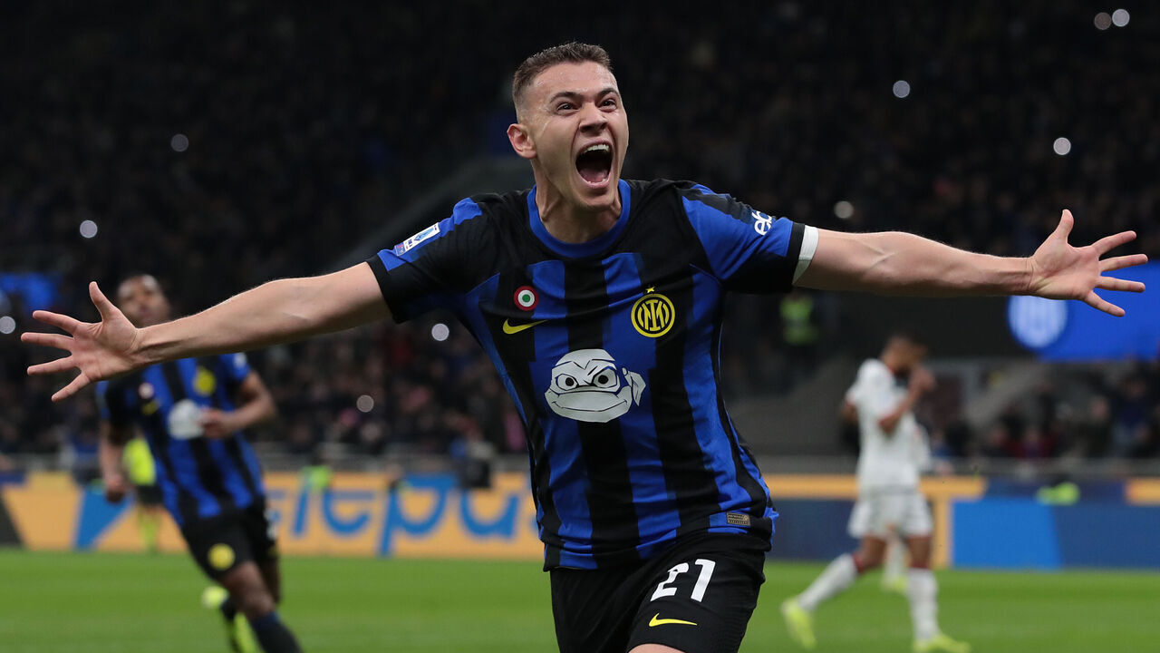 MILAN, ITALY - MARCH 04: Kristjan Asllani of FC Internazionale celebrates after scoring the team's first goal during the Serie A TIM match between FC Internazionale and Genoa CFC at Stadio Giuseppe Meazza on March 04, 2024 in Milan, Italy.