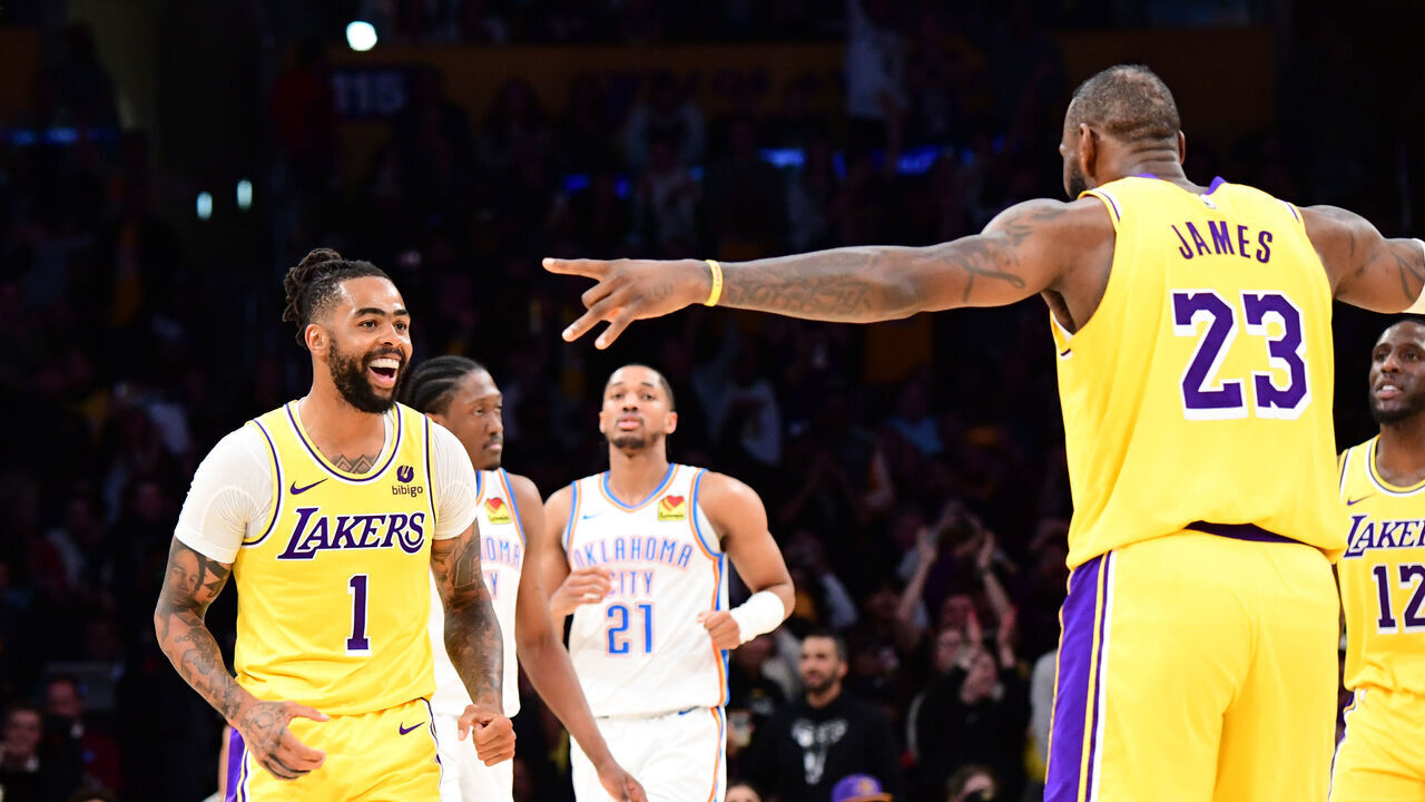LOS ANGELES, CA - MARCH 4: D'Angelo Russell #1 and LeBron James #23 of the Los Angeles Lakers celebrates during the game against the Oklahoma City Thunder on March 4, 2024 at Crypto.Com Arena in Los Angeles, California. NOTE TO USER: User expressly acknowledges and agrees that, by downloading and/or using this Photograph, user is consenting to the terms and conditions of the Getty Images License Agreement. Mandatory Copyright Notice: Copyright 2024 NBAE