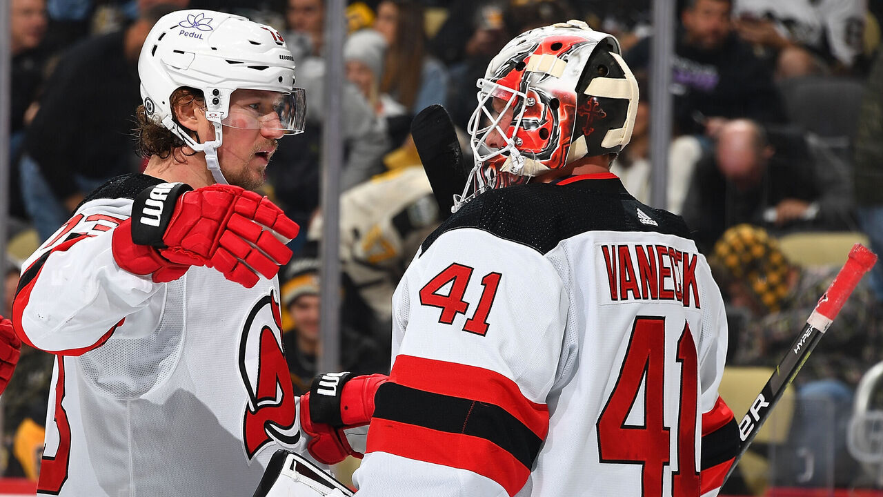 PITTSBURGH, PA - NOVEMBER 16: Tyler Toffoli #73 celebrates with Vitek Vanecek #41 of the New Jersey Devils after a 5-2 win over the Pittsburgh Penguins at PPG PAINTS Arena on November 16, 2023 in Pittsburgh, Pennsylvania.