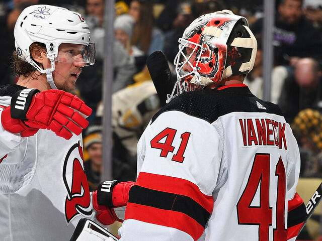 PITTSBURGH, PA - NOVEMBER 16: Tyler Toffoli #73 celebrates with Vitek Vanecek #41 of the New Jersey Devils after a 5-2 win over the Pittsburgh Penguins at PPG PAINTS Arena on November 16, 2023 in Pittsburgh, Pennsylvania.