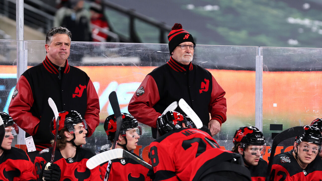 EAST RUTHERFORD, NEW JERSEY - FEBRUARY 17: Head coach Lindy Ruff of the New Jersey Devils looks on from behind the bench during the second period of the 2024 Navy Federal Credit Union Stadium Series game between the Philadelphia Flyers and the New Jersey Devils at MetLife Stadium on February 17, 2024 in East Rutherford, New Jersey.