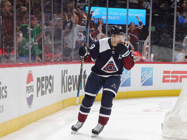 DENVER, COLORADO - MARCH 04: Nathan MacKinnon #29 of the Colorado Avalanche celebrates after scoring a goal against the Chicago Blackhawks at Ball Arena on March 04, 2024 in Denver, Colorado.
